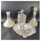 Group of vintage glass decanters and a bowl