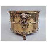 Vintage brass planter featuring ram's head ring