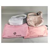 Pair of Francesco Biasia women's handbags