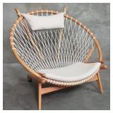 Hans J. Wegner-style wood and woven roped lounge