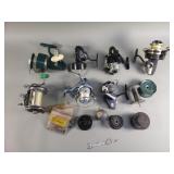 Group of vintage fishing reels and accessories