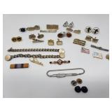 Group of vintage cufflinks, tie pins, etc.