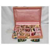 Vintage costume jewelry in pink jewelry box