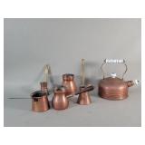 Group of vintage copper and brass ladles and