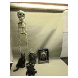 Halloween black cat, haunted clock, skeleton,