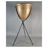 Mid century aluminum planterin an iron tripod