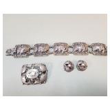 Danish sterling and 830 repousse fish parure set