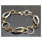14k textured two tone gold bracelet. Clasp bent.
