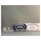 Pair of vintage license plates with metal