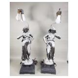 Pair of vintage spelter figural table lamps on a