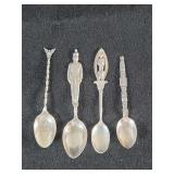 Four sterling silver souvenir spoons