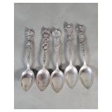 Five sterling silver souvenir spoons