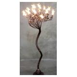 Art Nouveau-style iron floor lamp featuring a