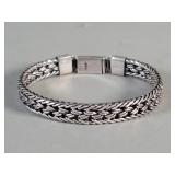 Sterling silver woven chain bracelet featuring a