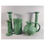 Group of ceramic candle holders, pitcher, and