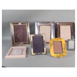 Group of metal and glass picture frames