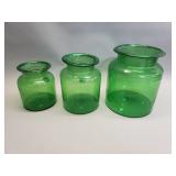 Three vintage green glass jars