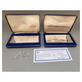 Pair of National Collectors Mint $1 Silver