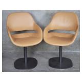 Pair of Zanotta Italian leather swivel chairs