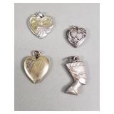 Group of sterling silver pendants