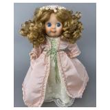 First Edition Porcelain Doll in Pink Dress