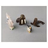 Four Handcrafted Miniature Figurines