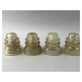 Four Hemingray Glass Insulators