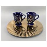 Two Blue Y China Cups and Gold Charger