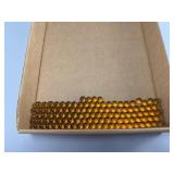 Lot of Amber Glass Marbles in Box