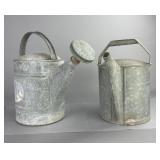 Two Galvanized Metal Watering Cans