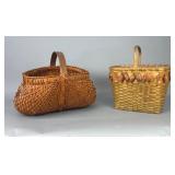 Two Woven Baskets with Wooden Handles