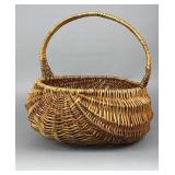 Woven Basket with Rounded Body and Handle