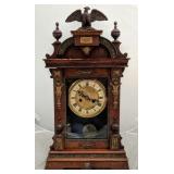 Vintage wooden mantle clock with eagle