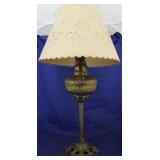 Brass banquet lamp with cut out shade