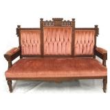 Victorian walnut carved triple settee
