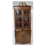 Edwardian inlaid bow front corner cabinet