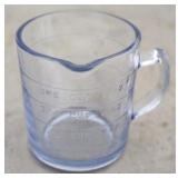 Blue glass measuring cup