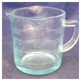 Blue glass measuring cup