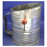 Vintage metal flour sifter