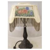 Lamp with fringed shade