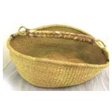 Vintage sweetgrass basket with handle