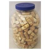 Plastic container full of wine bottle corks