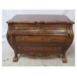 4-Drawer Bombe Chest With Paw Feet