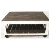 Painted wooden cocktail table on wheels