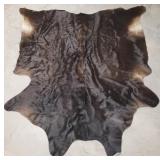 Dark brown / black cowhide rug