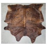 Brown cowhide rug