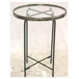 Framed glass top table on folding base