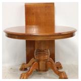 Round dining table on claw pedestal w/ leaf