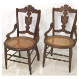 Pair walnut Victorian carved & caned chairs