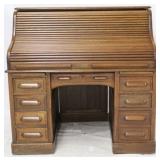 Oak S roll top raised panel desk